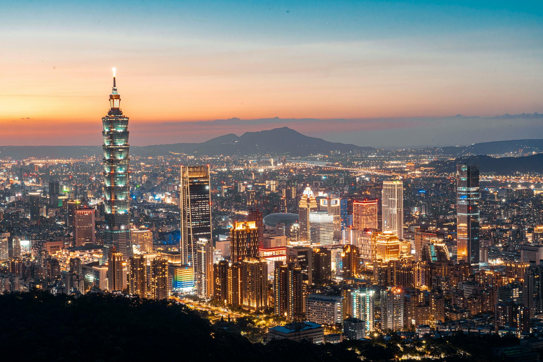 cityscape of illuminated taipei at sunset taiwan